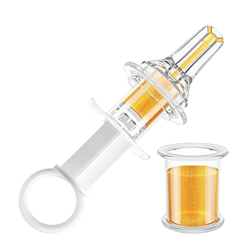 haakaa-seringue-d-alimentation-orale-avec-t-tine-et-gobelet-doseur image 1